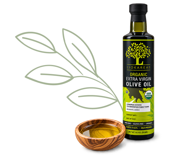 LioKareas organic extra virgin olive oil bottle with golden olive oil served in a wooden bowl.