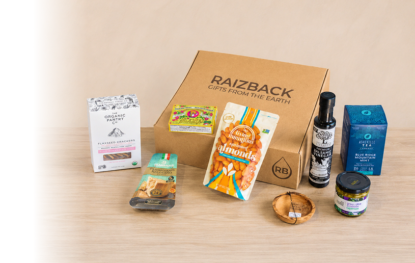 RaizBack premium gourmet gift box with flaxseed crackers, sprouted almonds, Parmesan crisps, balsamic vinegar, mint tea and olive tapenade